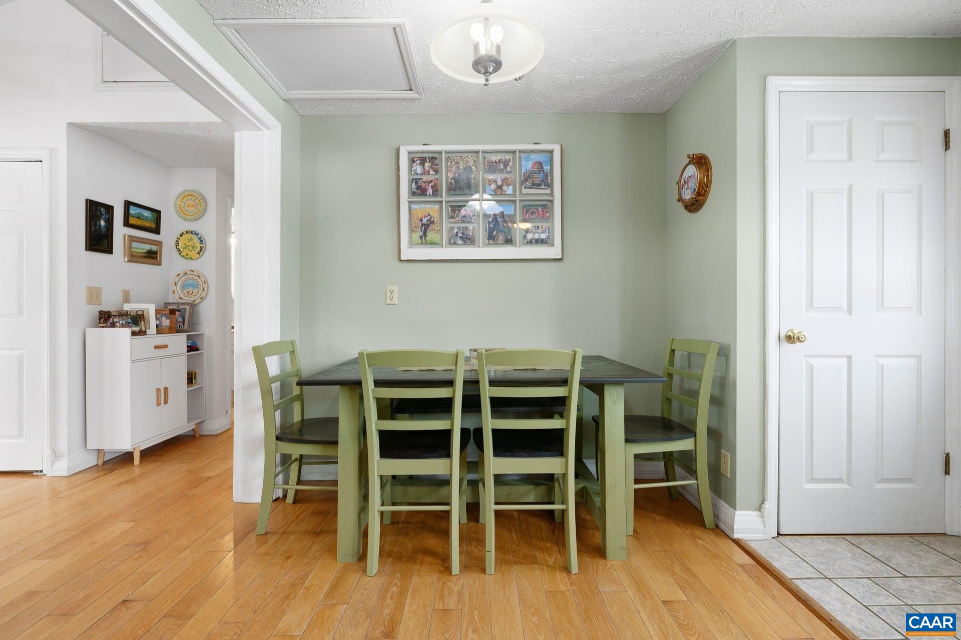 979 Cedar Grove Road Ruckersville, VA 22968 - Photo 10 of 33 a view of a livingroom with furniture and wooden floor