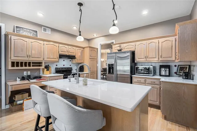 $499,000 | 13724 Pembroke Circle, Leawood, KS 66224