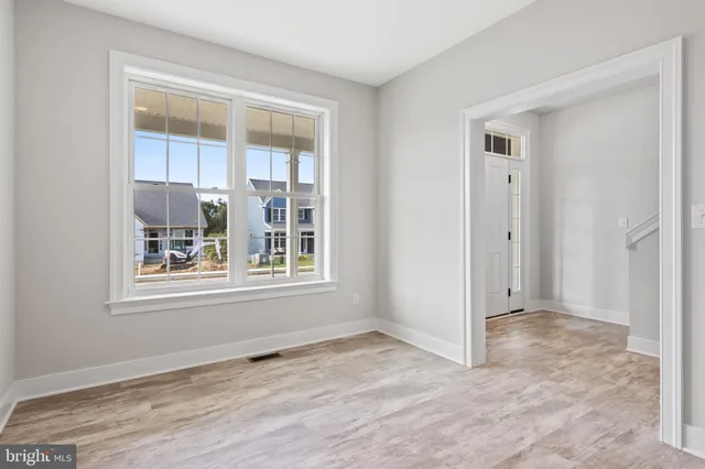 a view of a kitchen with a sink and a window