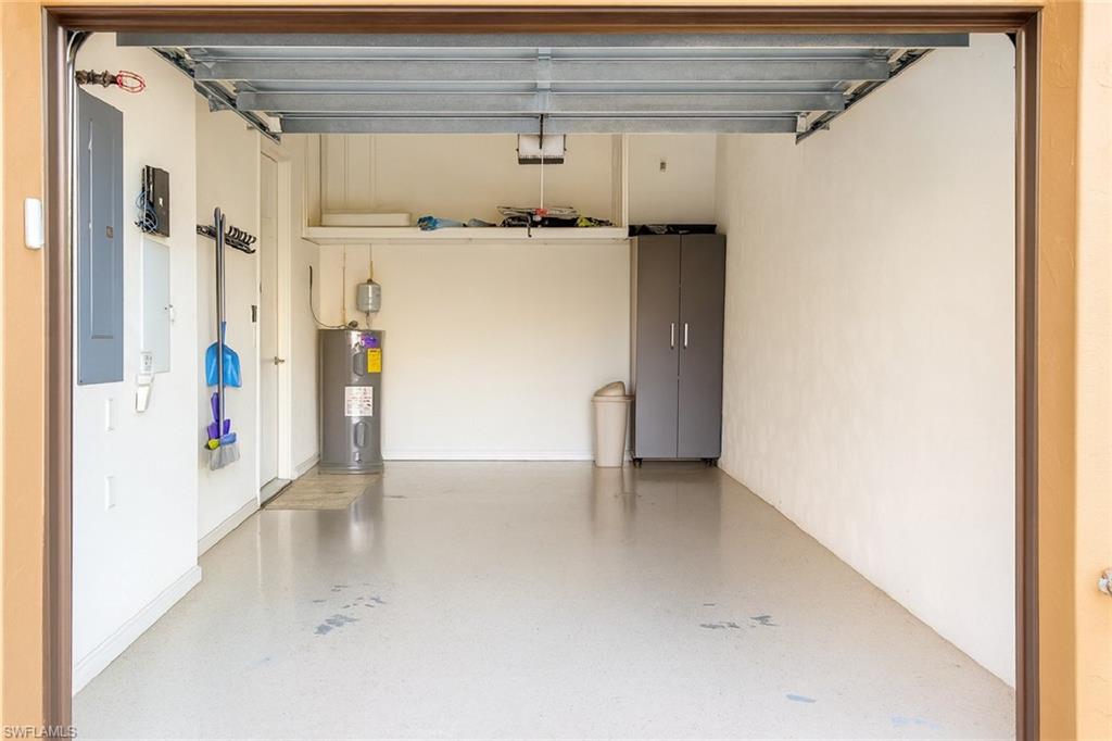 9055 Capistrano Street North, Unit 4206 Naples, FL 34113 - Photo 25 of 45 a view of storage and utility room