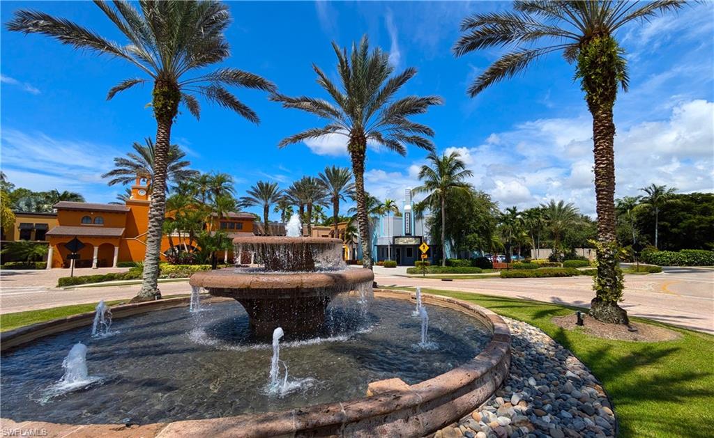 9055 Capistrano Street North, Unit 4206 Naples, FL 34113 - Photo 34 of 45 a view of a yard with palm trees