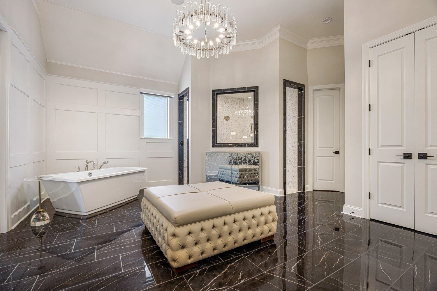 262 Beckham Drive Collierville, TN 38017 - Photo 15 of 32 a bedroom with a bed and a chandelier