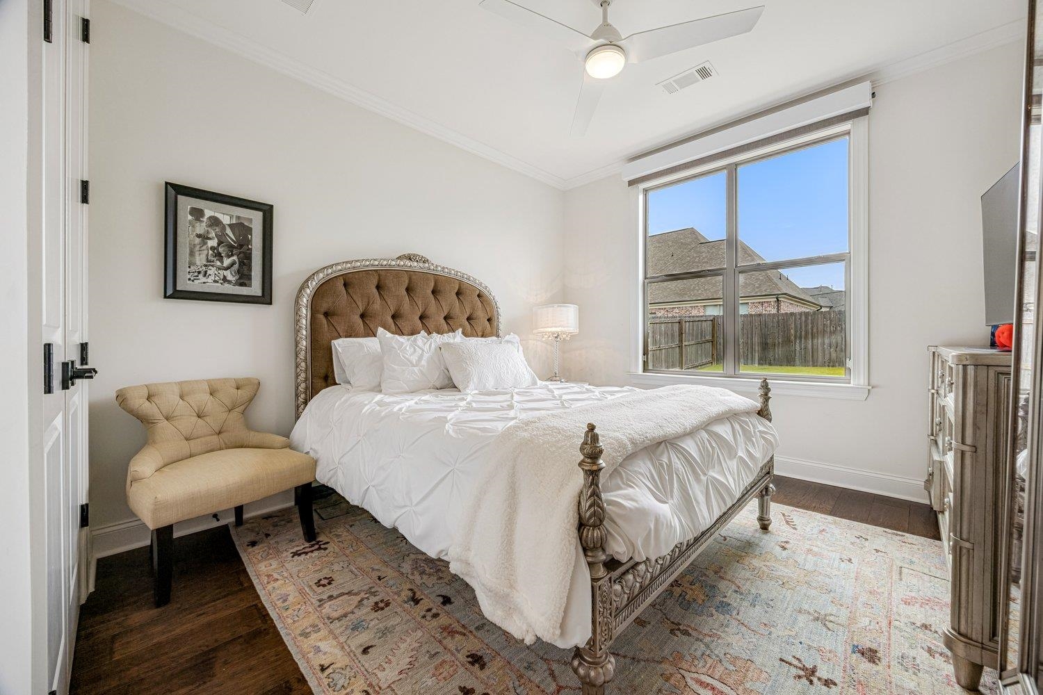 262 Beckham Drive Collierville, TN 38017 - Photo 17 of 32 a bedroom with a bed and a large window