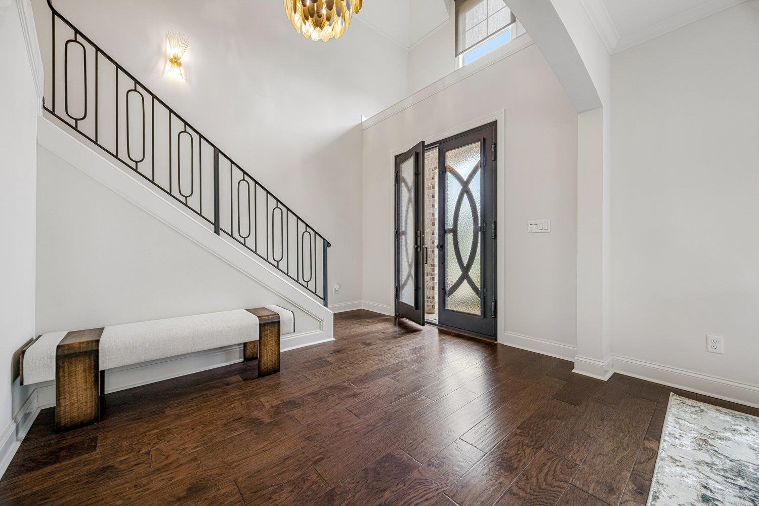 262 Beckham Drive Collierville, TN 38017 - Photo 3 of 32 a view of front door with hallway and wooden floor