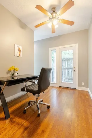 a view of a patio with couches chairs and potted plants