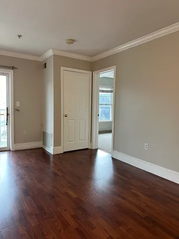 a view of front door and deck of the house
