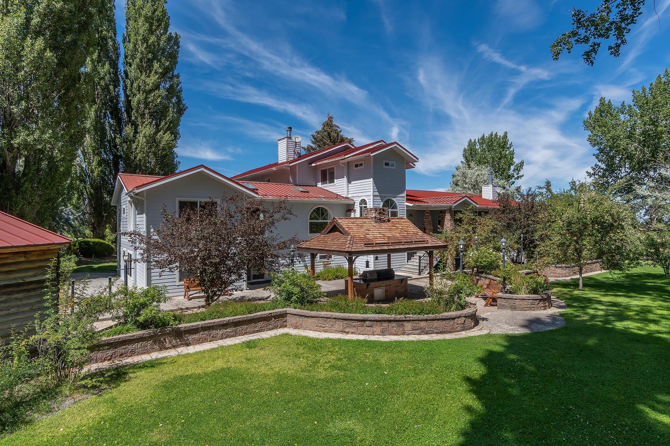 59047 Old Lake Road Christmas Valley, OR 97641 - Photo 4 of 55 Beautiful back yard view with patio and outdoor kitchen
