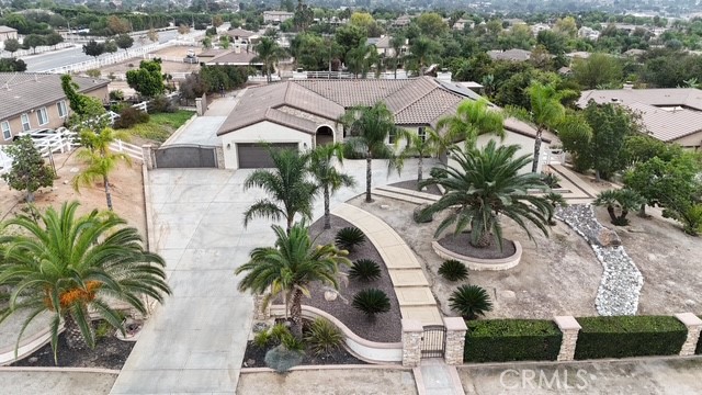 16935 Eagle Peak Road Riverside, CA 92504 - Photo 1 of 75 an aerial view of residential houses with outdoor space and swimming pool