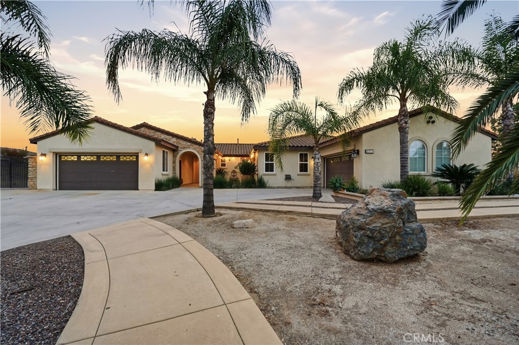 16935 Eagle Peak Road Riverside, CA 92504 - Photo 2 of 75 a front view of a house with a garden