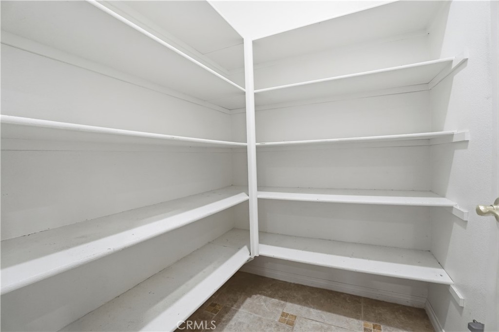 16935 Eagle Peak Road Riverside, CA 92504 - Photo 25 of 75 a view of an empty walk in closet