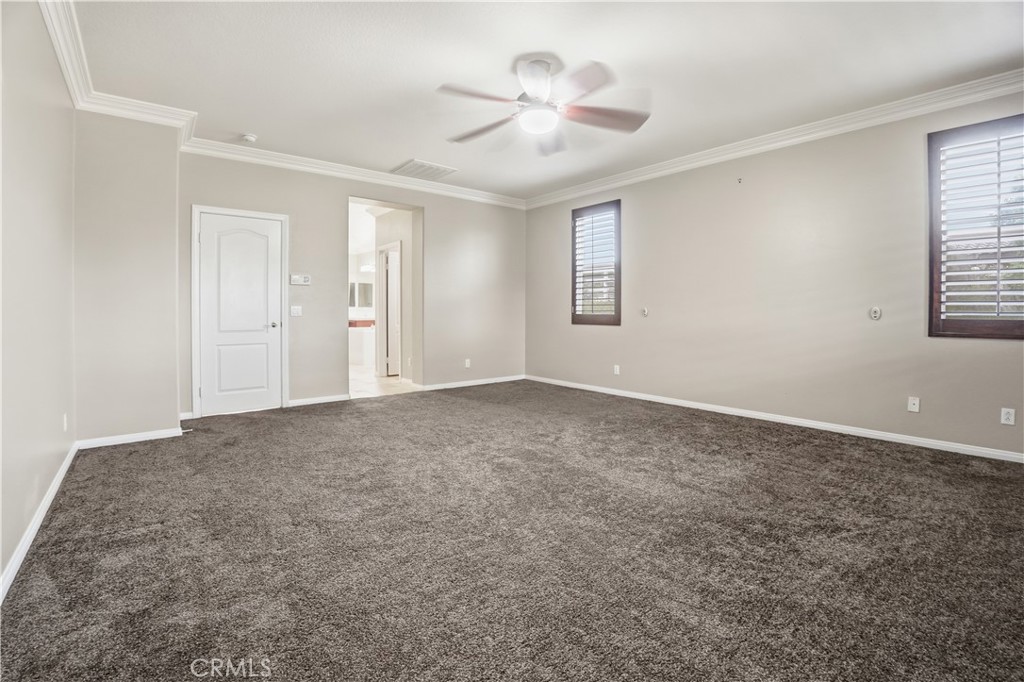 16935 Eagle Peak Road Riverside, CA 92504 - Photo 30 of 75 wooden floor in an empty room with a window
