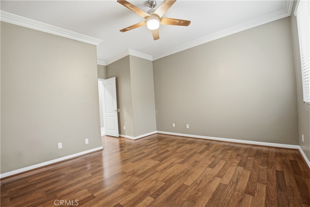 16935 Eagle Peak Road Riverside, CA 92504 - Photo 38 of 75 wooden floor in an empty room with a window