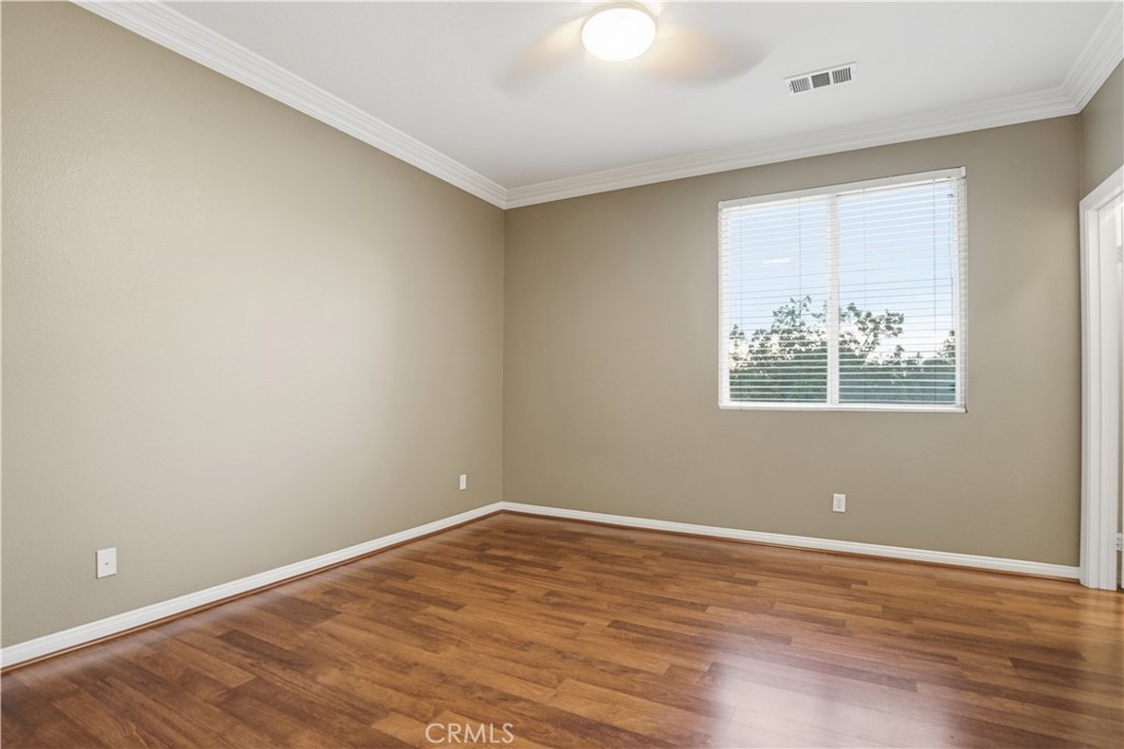 16935 Eagle Peak Road Riverside, CA 92504 - Photo 39 of 75 wooden floor in an empty room with a window