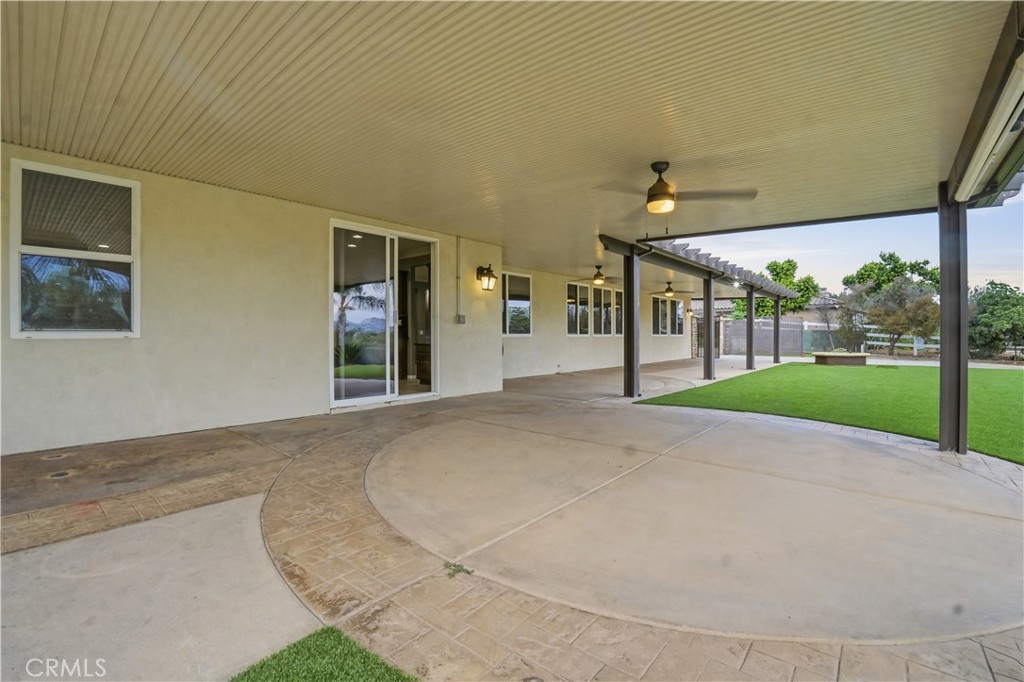16935 Eagle Peak Road Riverside, CA 92504 - Photo 62 of 75 a view of a house with a backyard and porch
