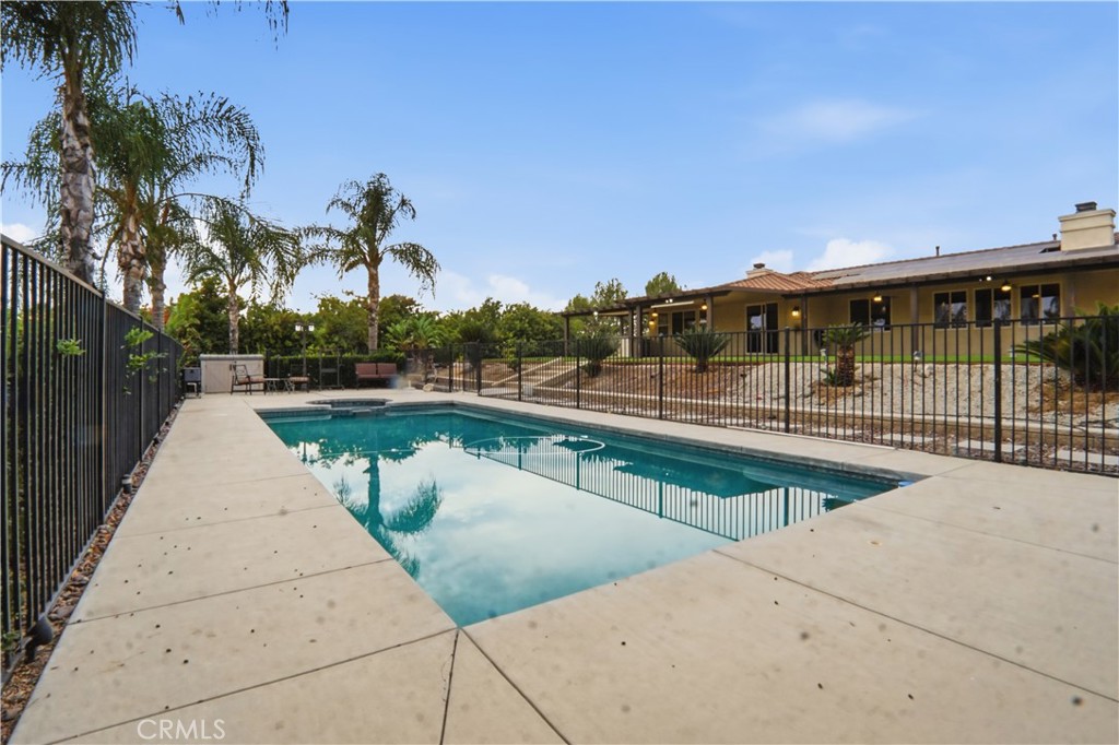 16935 Eagle Peak Road Riverside, CA 92504 - Photo 67 of 75 a view of swimming pool with outdoor seating and plants