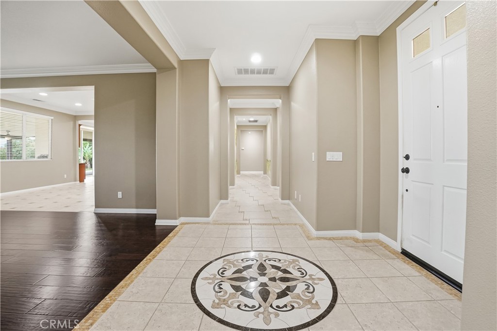 16935 Eagle Peak Road Riverside, CA 92504 - Photo 8 of 75 a view of a hallway with dining area