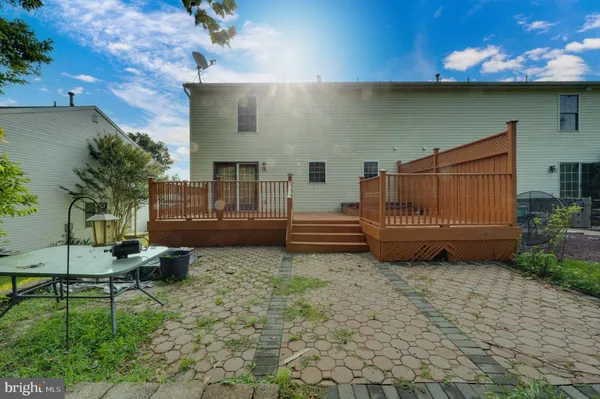 a view of a couches in patio of a house