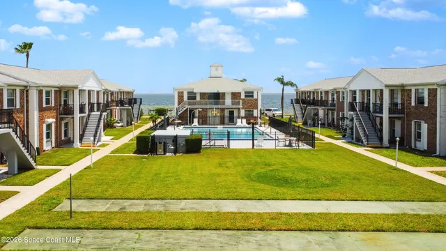 a view of a house with swimming pool