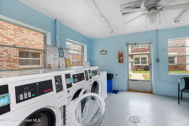 a utility room with dryer and washer