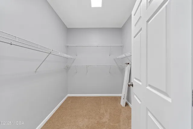 a view of a house with a roof deck