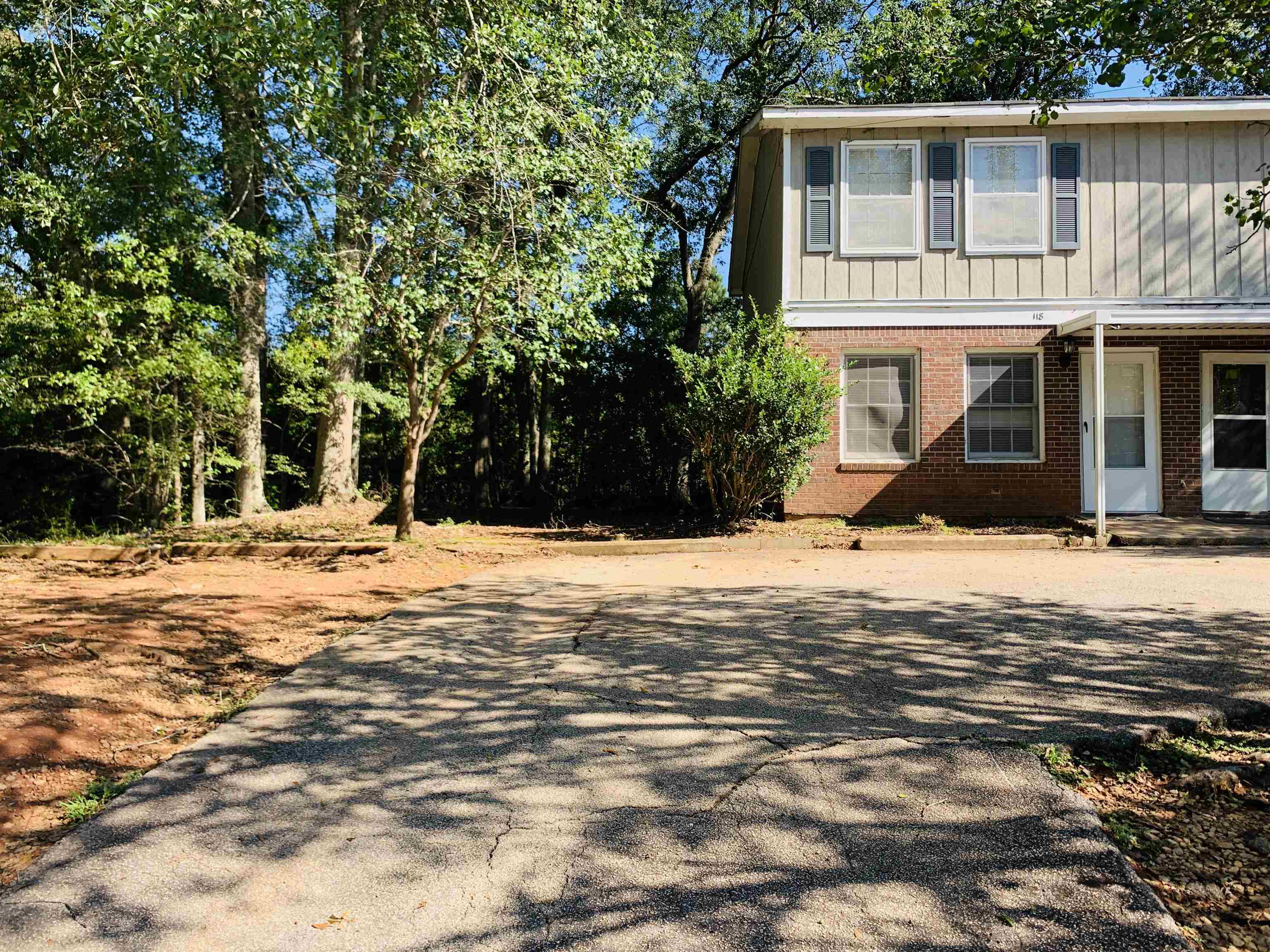 118 Lafayette Court, Unit 118 LaGrange, GA 30241 - Photo 2 of 21 a view of a house with a yard