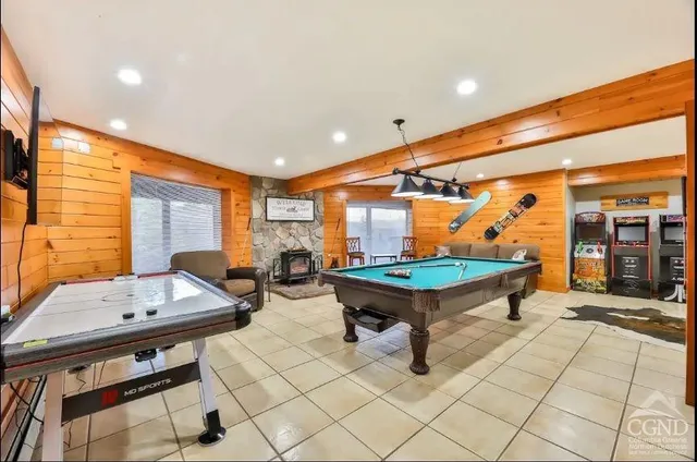 a view of a town with mountains in the background