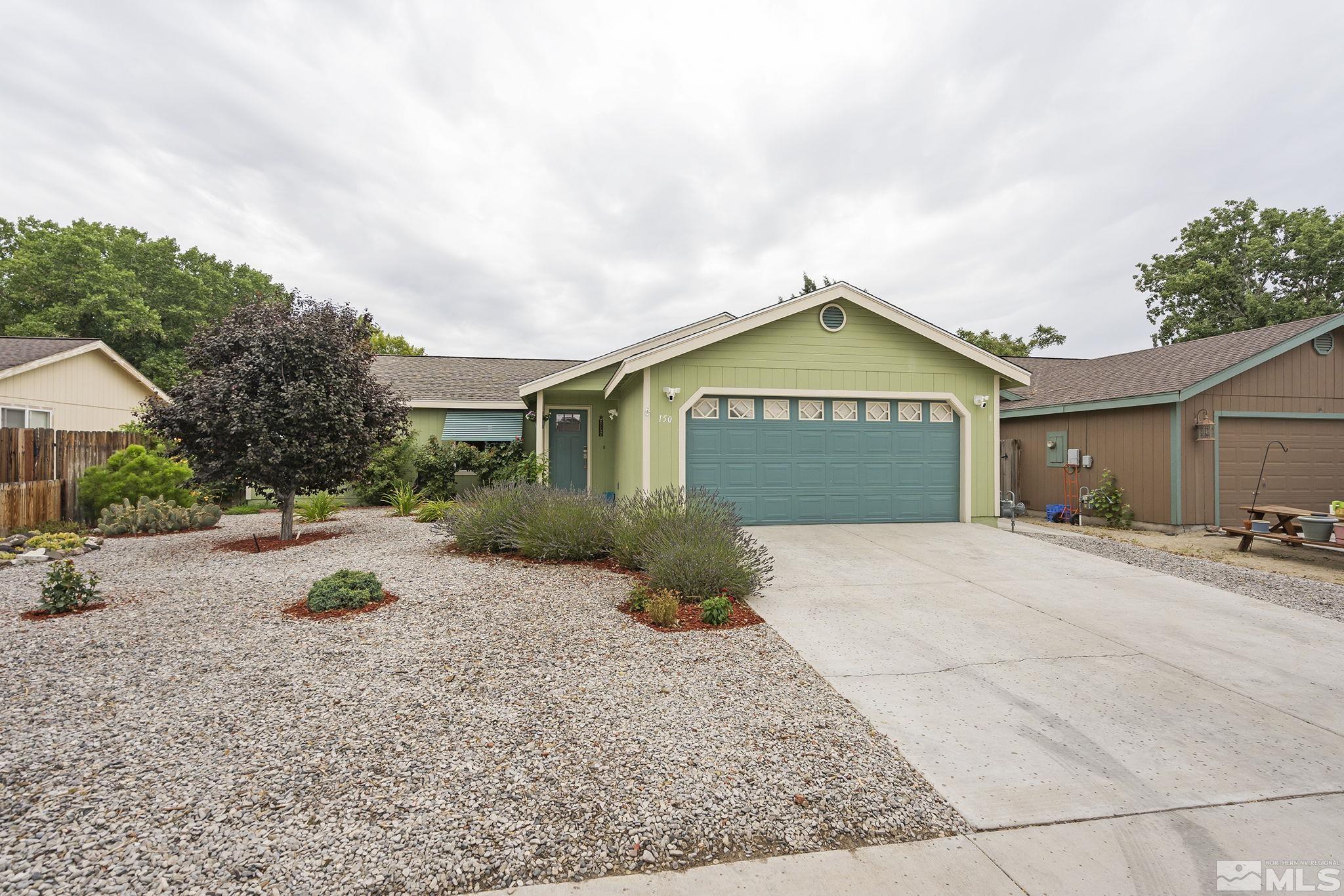 a front view of a house with entertaining space