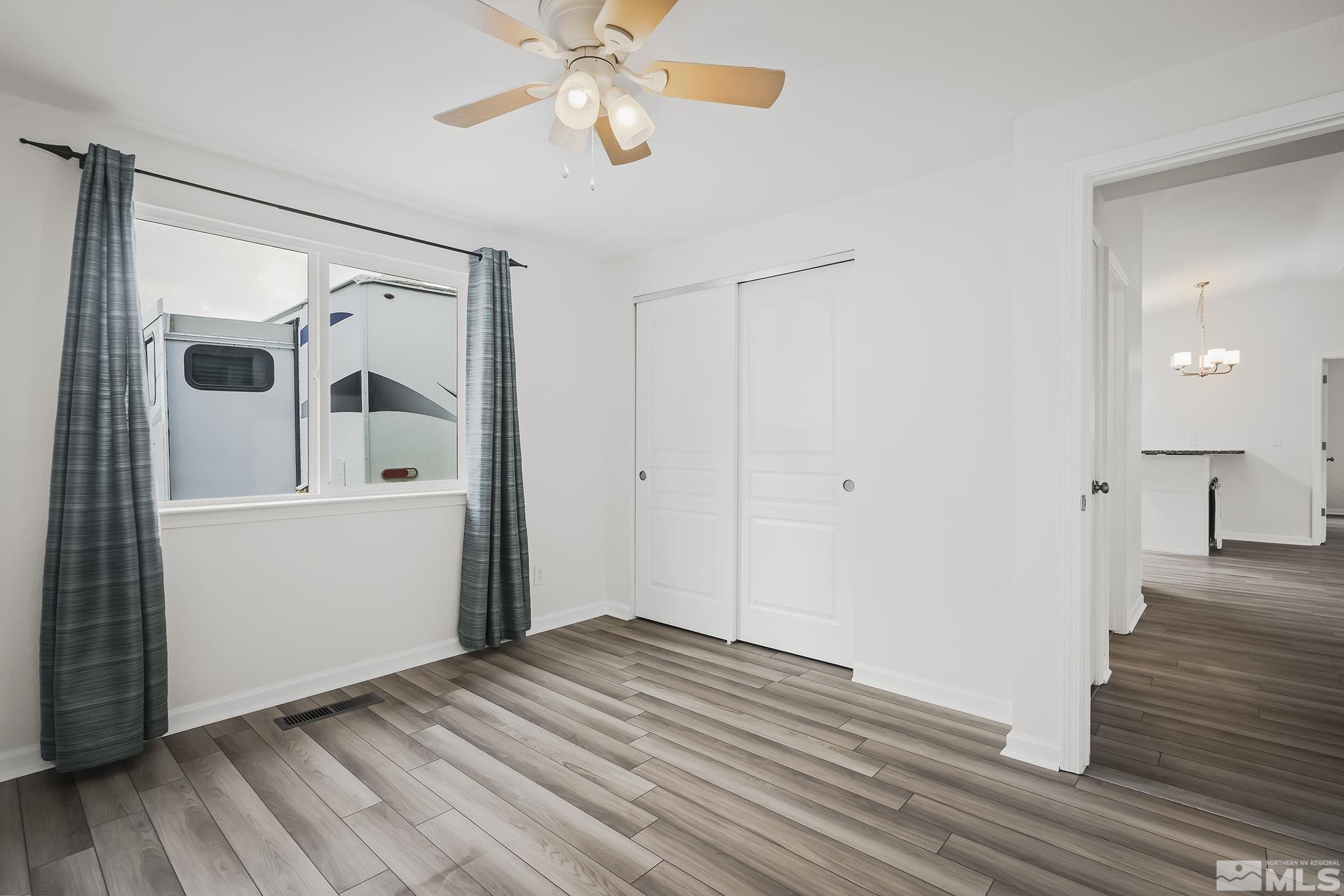 150 Rosecrest Drive Fernley, NV 89408 - Photo 21 of 28 a view of a livingroom with wooden floor