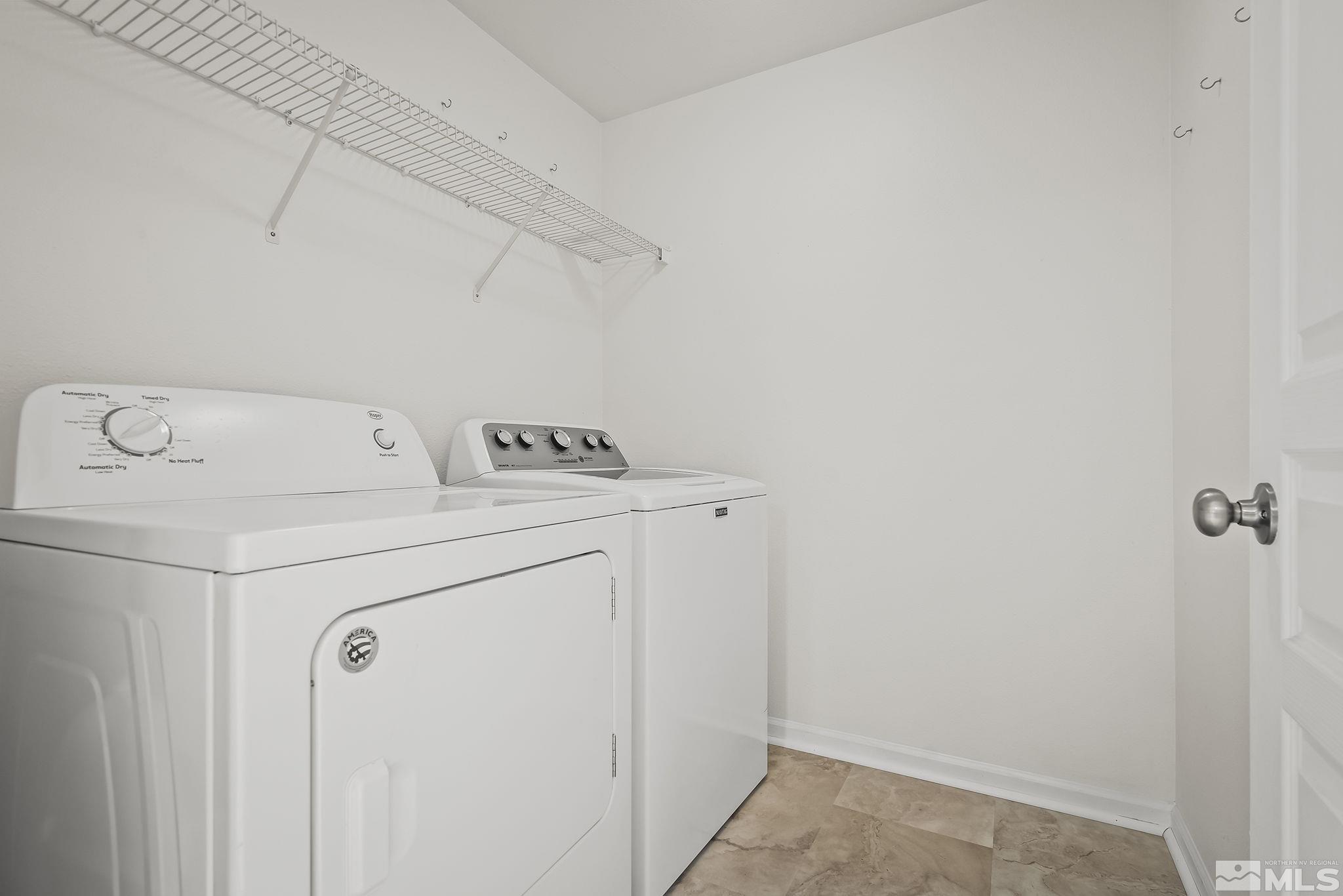 150 Rosecrest Drive Fernley, NV 89408 - Photo 23 of 28 a utility room with dryer and washer