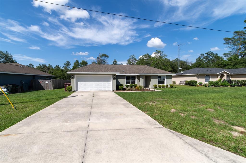 5107 Southwest 165th St Road Ocala, FL 34473 - Photo 30 of 34 a view of house with garden
