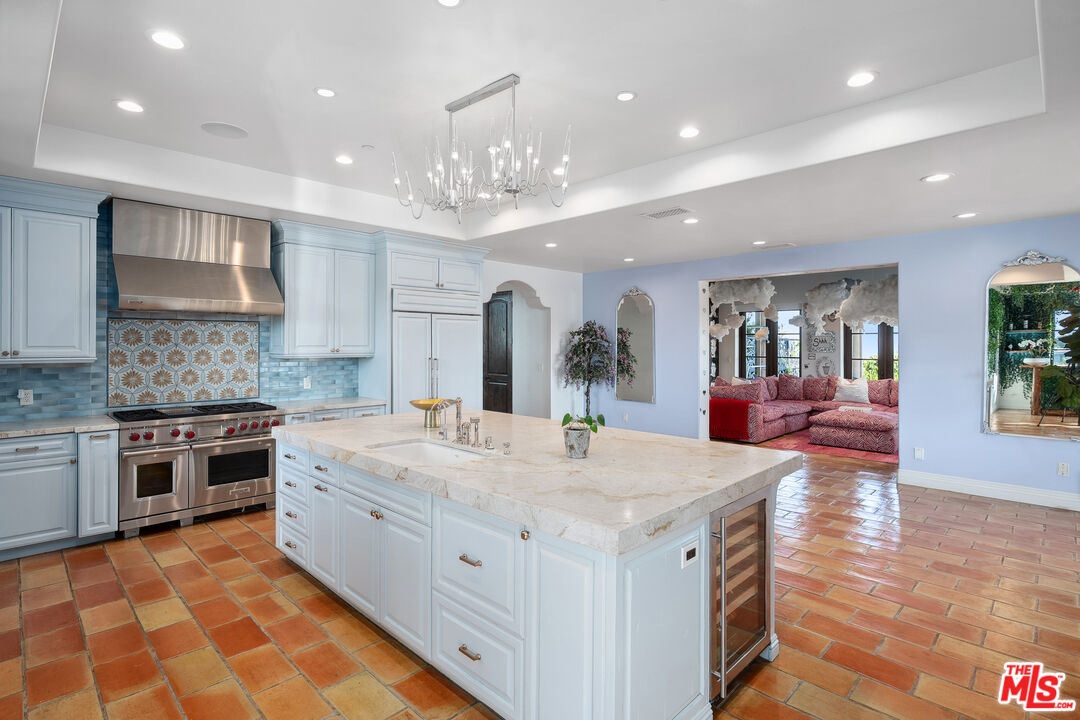 1650 Luse Tank Road Topanga, CA 90290 - Photo 11 of 50 a large kitchen with kitchen island a sink stainless steel appliances and cabinets