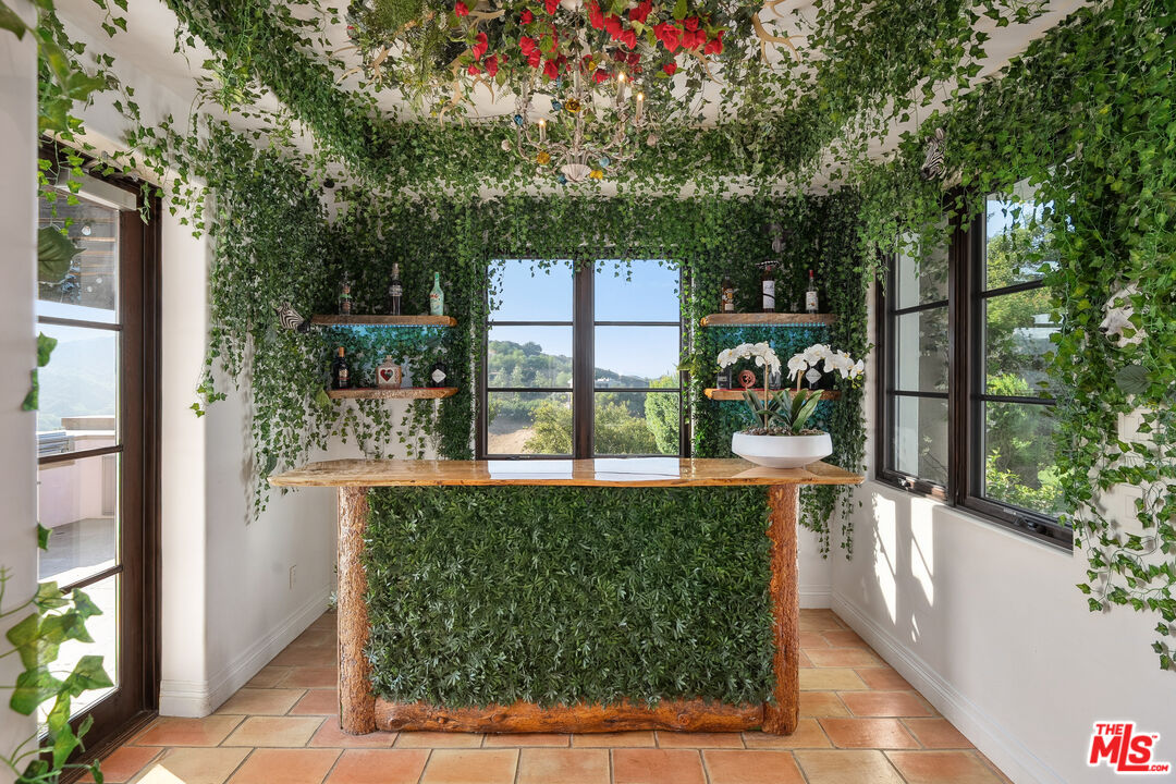 1650 Luse Tank Road Topanga, CA 90290 - Photo 12 of 50 a view of a small yard and a fountain