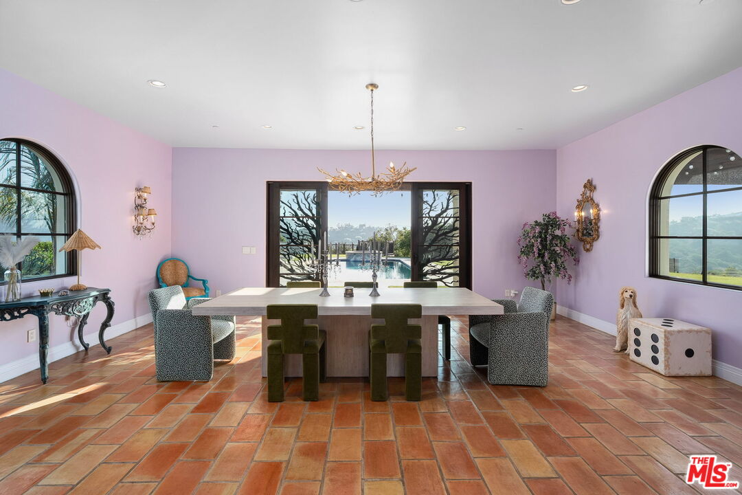 1650 Luse Tank Road Topanga, CA 90290 - Photo 17 of 50 a living room with furniture a window and desk