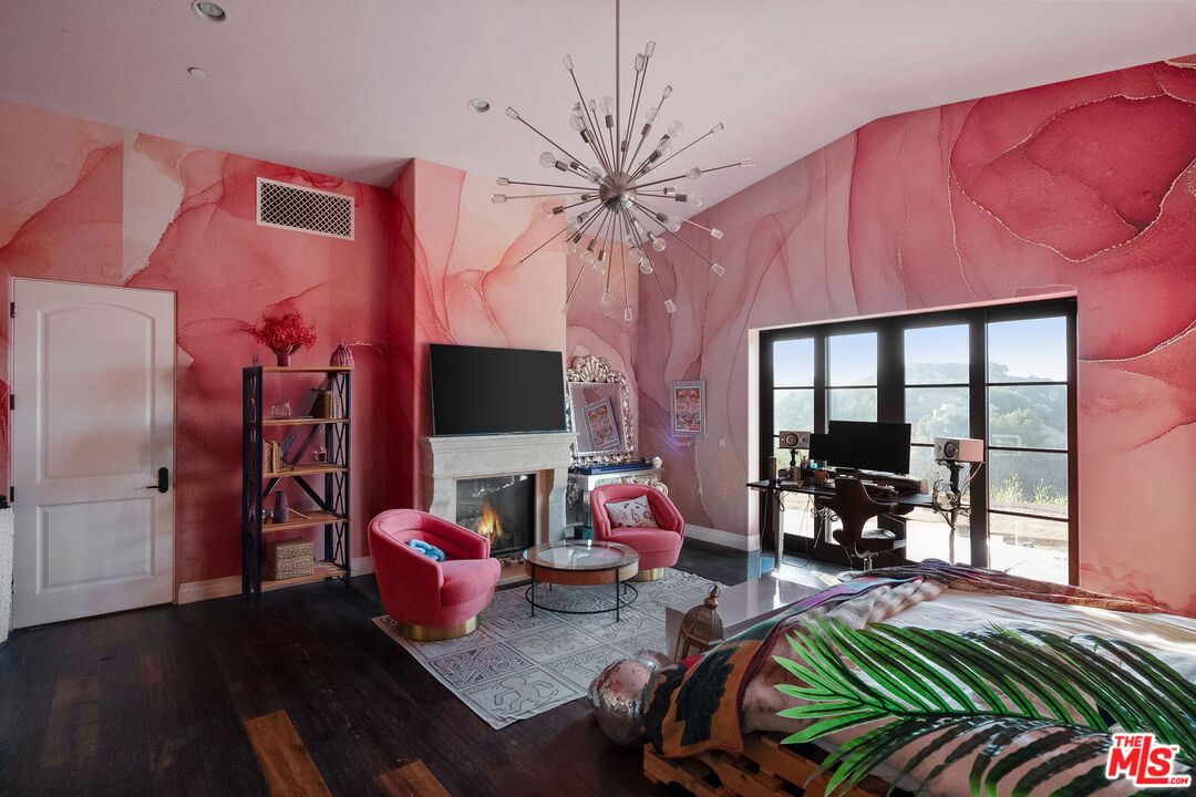 1650 Luse Tank Road Topanga, CA 90290 - Photo 42 of 50 a living room with furniture fireplace and flat screen tv