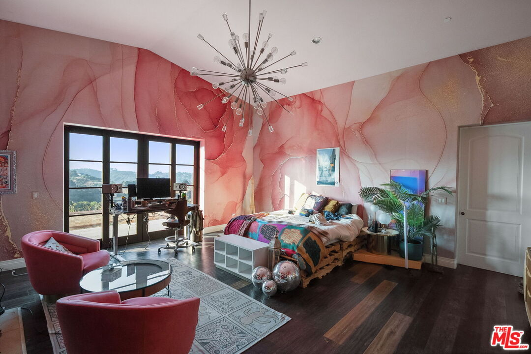 1650 Luse Tank Road Topanga, CA 90290 - Photo 43 of 50 a bedroom with furniture and a potted plant