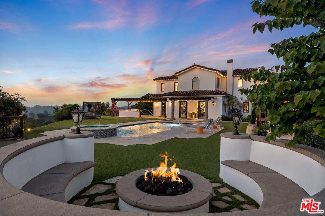 1650 Luse Tank Road Topanga, CA 90290 - Photo 49 of 50 a front view of a house with a garden
