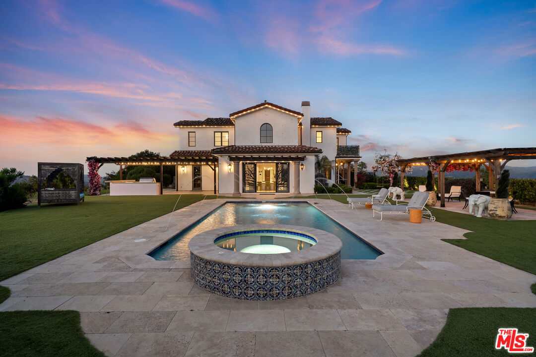 1650 Luse Tank Road Topanga, CA 90290 - Photo 5 of 50 a front view of a house with a garden