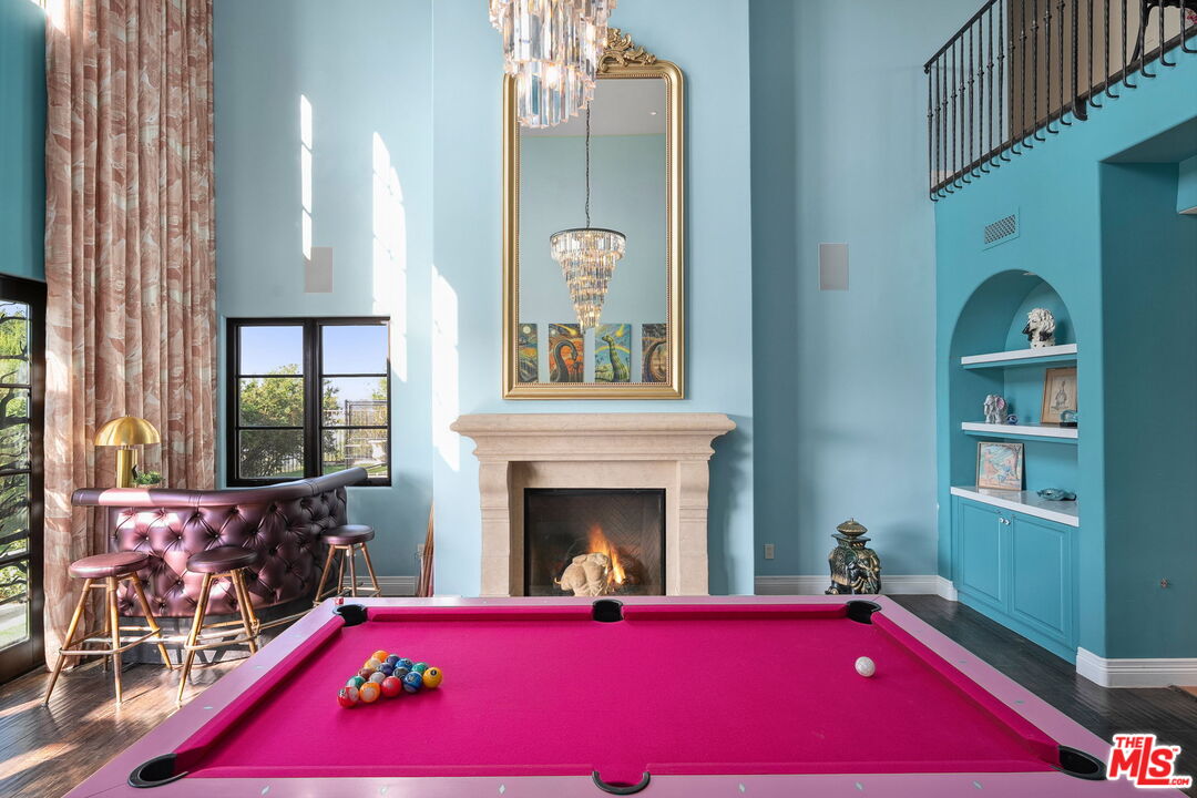 1650 Luse Tank Road Topanga, CA 90290 - Photo 8 of 50 a living room with furniture and a fireplace