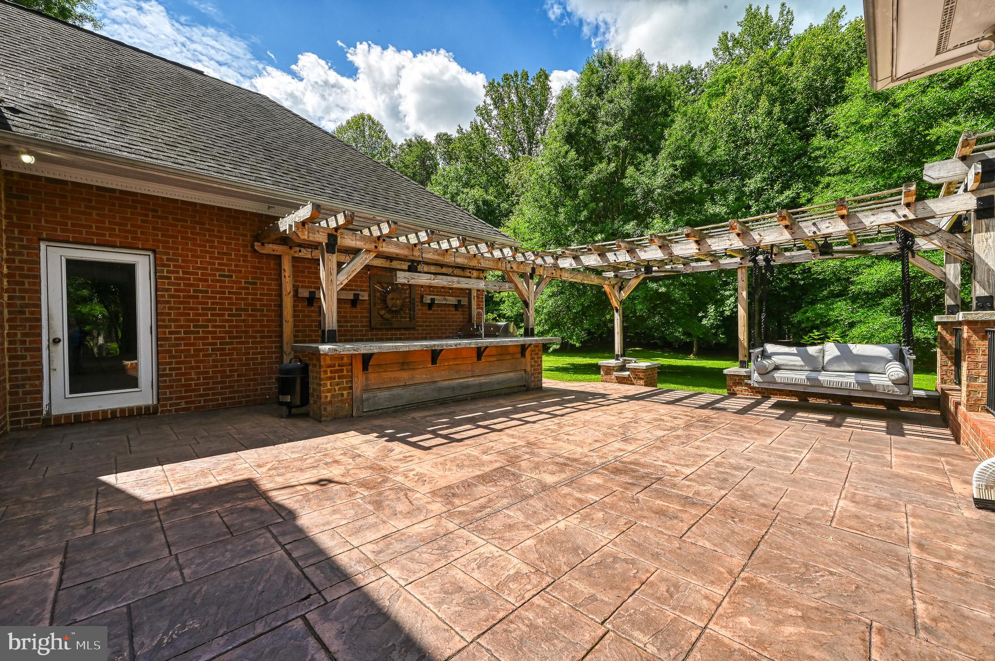 22282 Monrovia Road Orange, VA 22960 - Photo 11 of 60 Back patio and bar