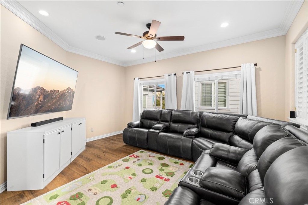 18 Bower Lane Ladera Ranch, CA 92694 - Photo 19 of 31 a living room with furniture and a flat screen tv