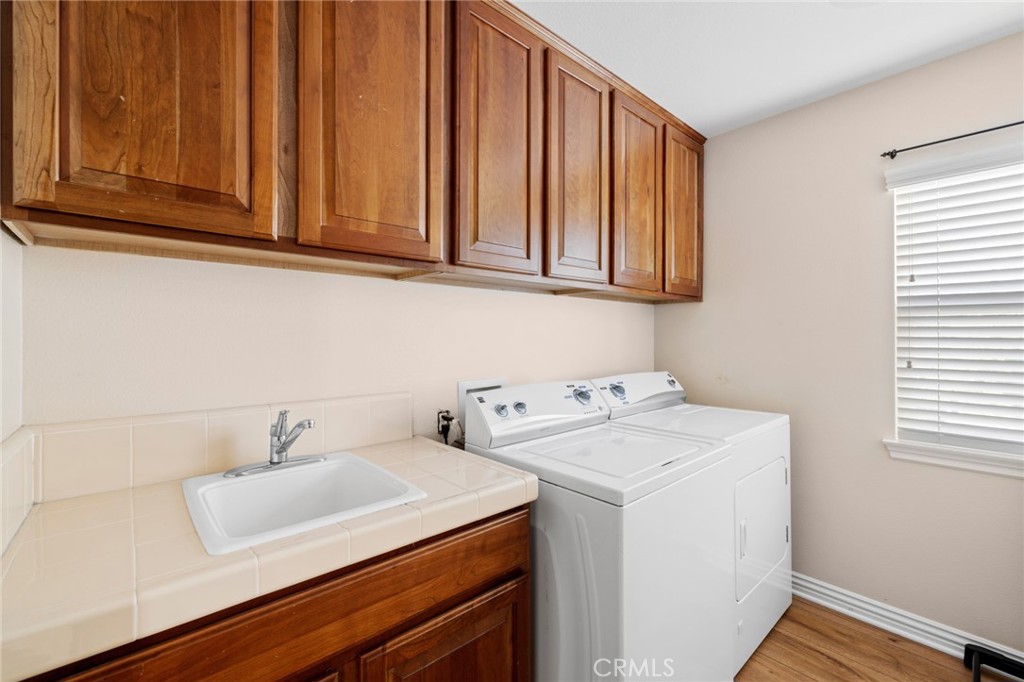18 Bower Lane Ladera Ranch, CA 92694 - Photo 23 of 31 a utility room with dryer and washer