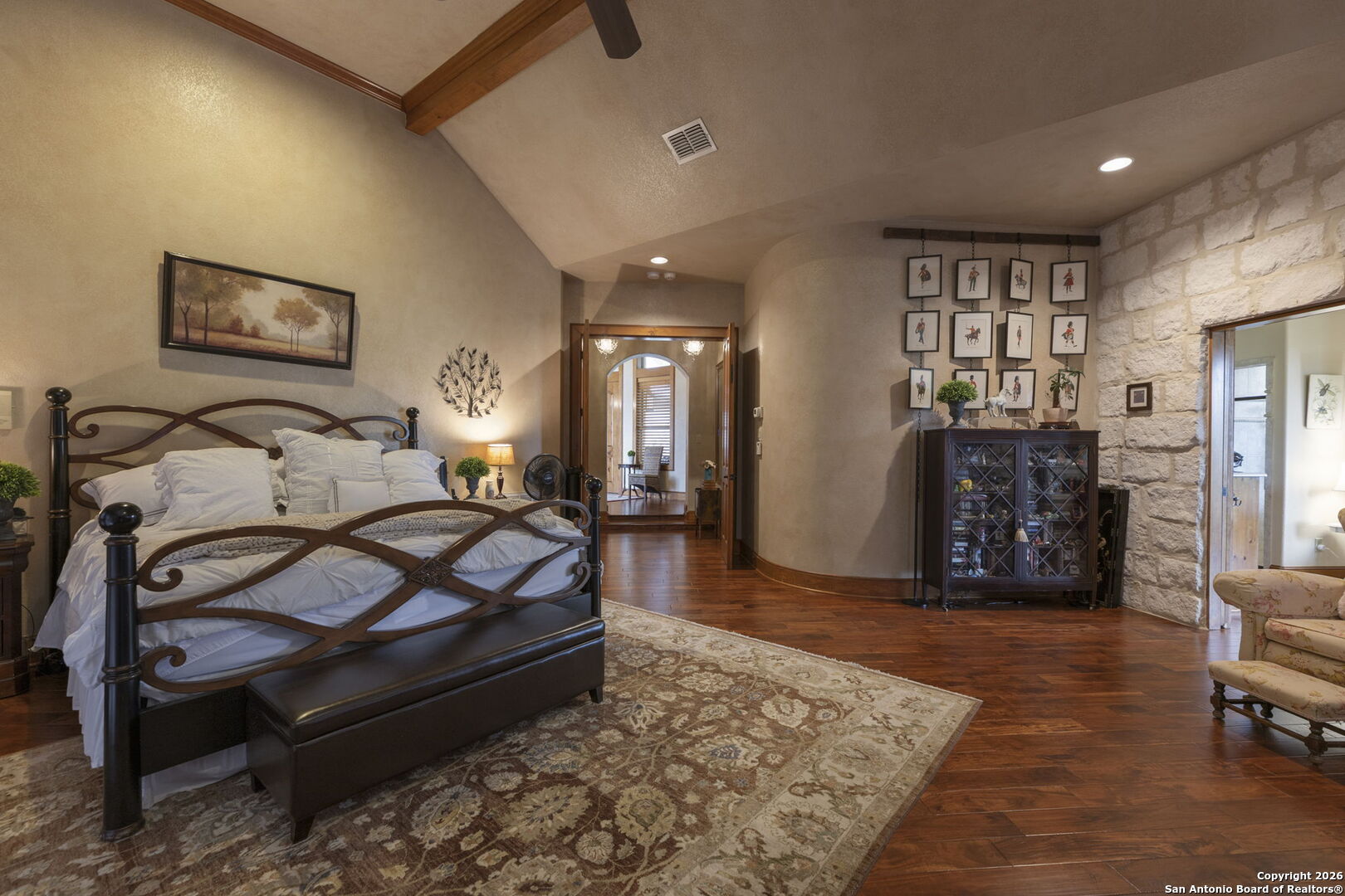 241 Seewald Road Boerne, TX 78006 - Photo 12 of 48 a bedroom with furniture and wooden floor