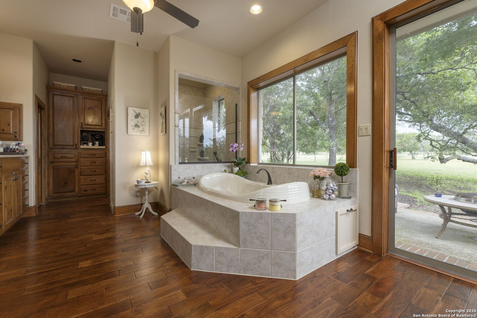 241 Seewald Road Boerne, TX 78006 - Photo 14 of 48 a view of a living room and hardwood floor