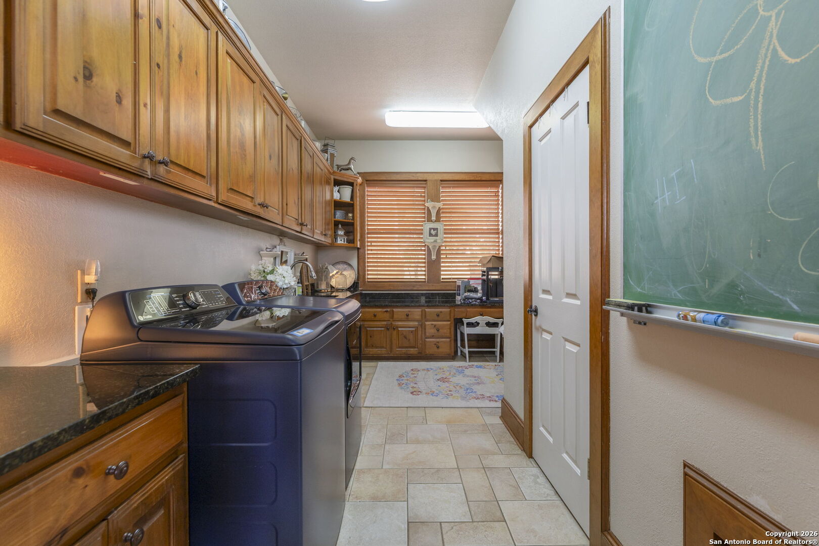 241 Seewald Road Boerne, TX 78006 - Photo 23 of 48 a kitchen with granite countertop a sink and a stove