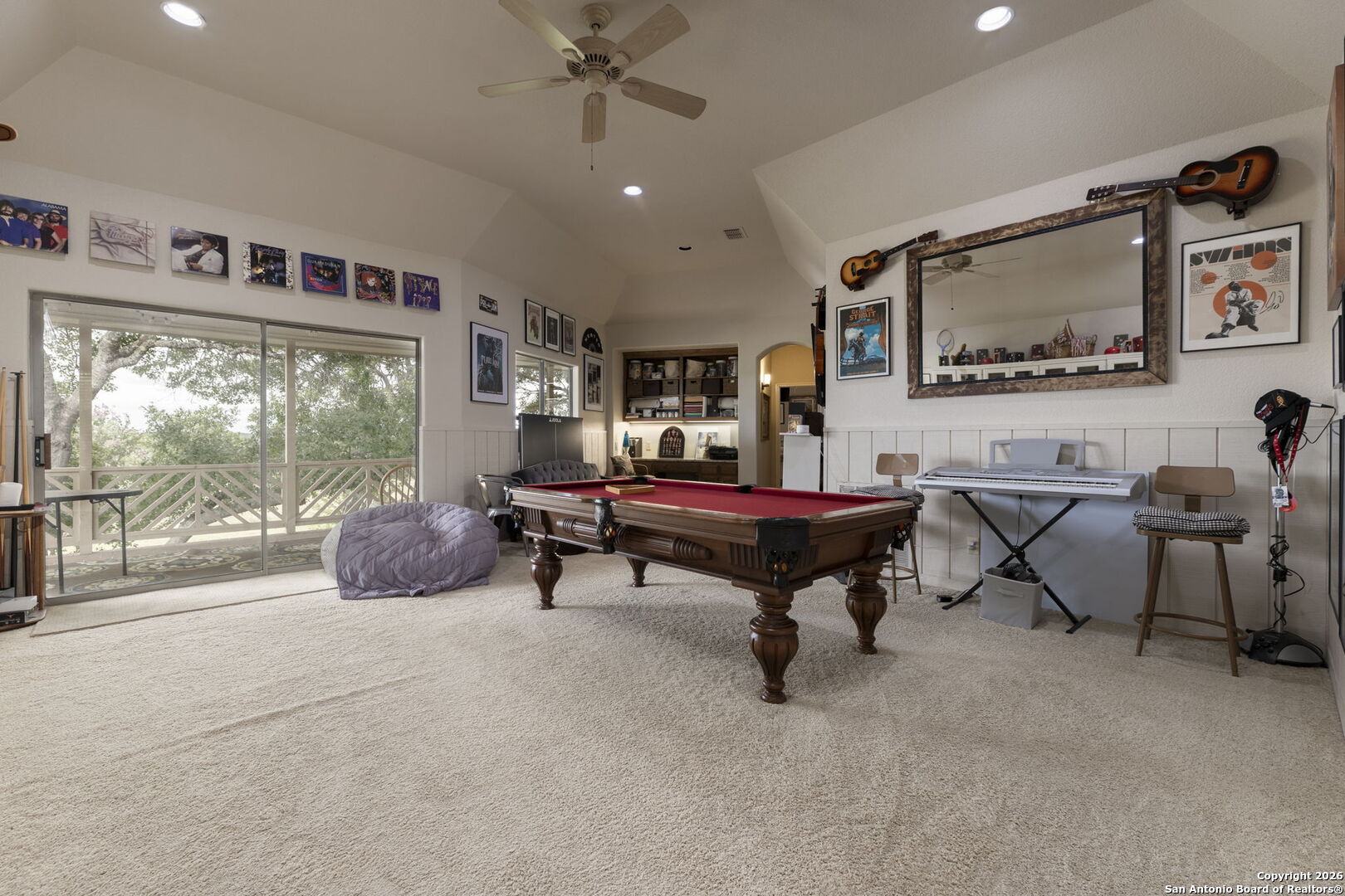 241 Seewald Road Boerne, TX 78006 - Photo 27 of 48 a living room with furniture and a flat screen tv