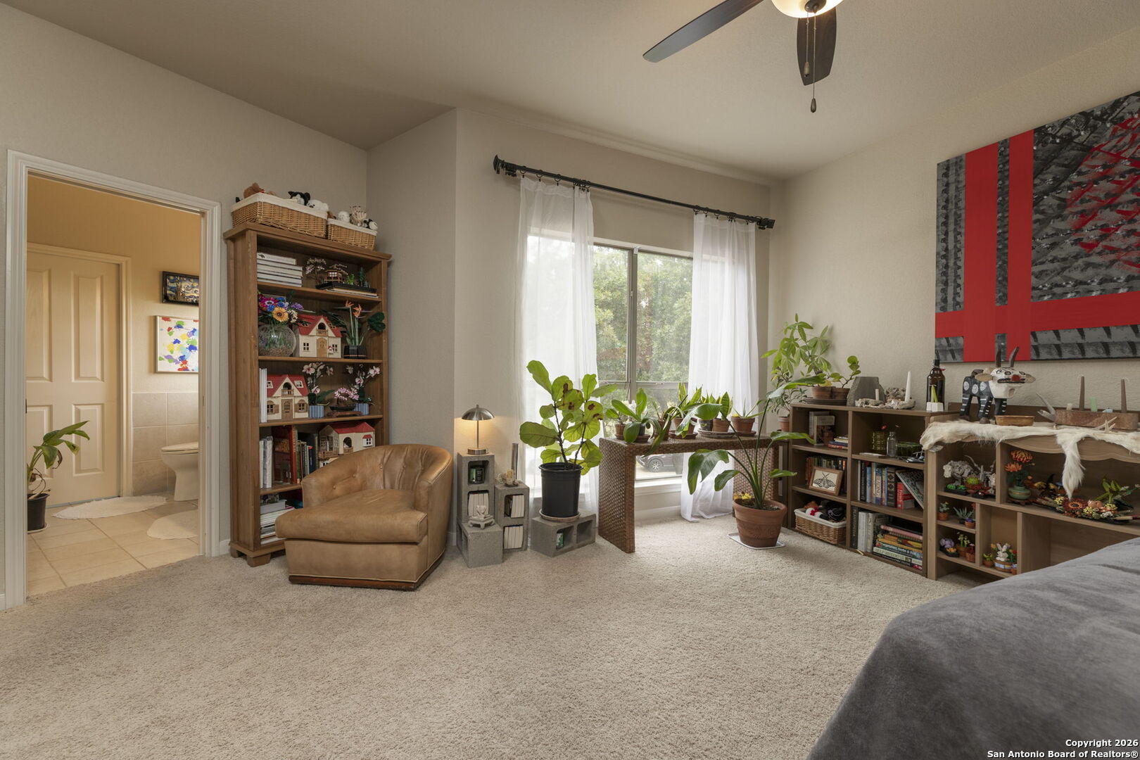 241 Seewald Road Boerne, TX 78006 - Photo 30 of 48 a living room with furniture and a potted plant