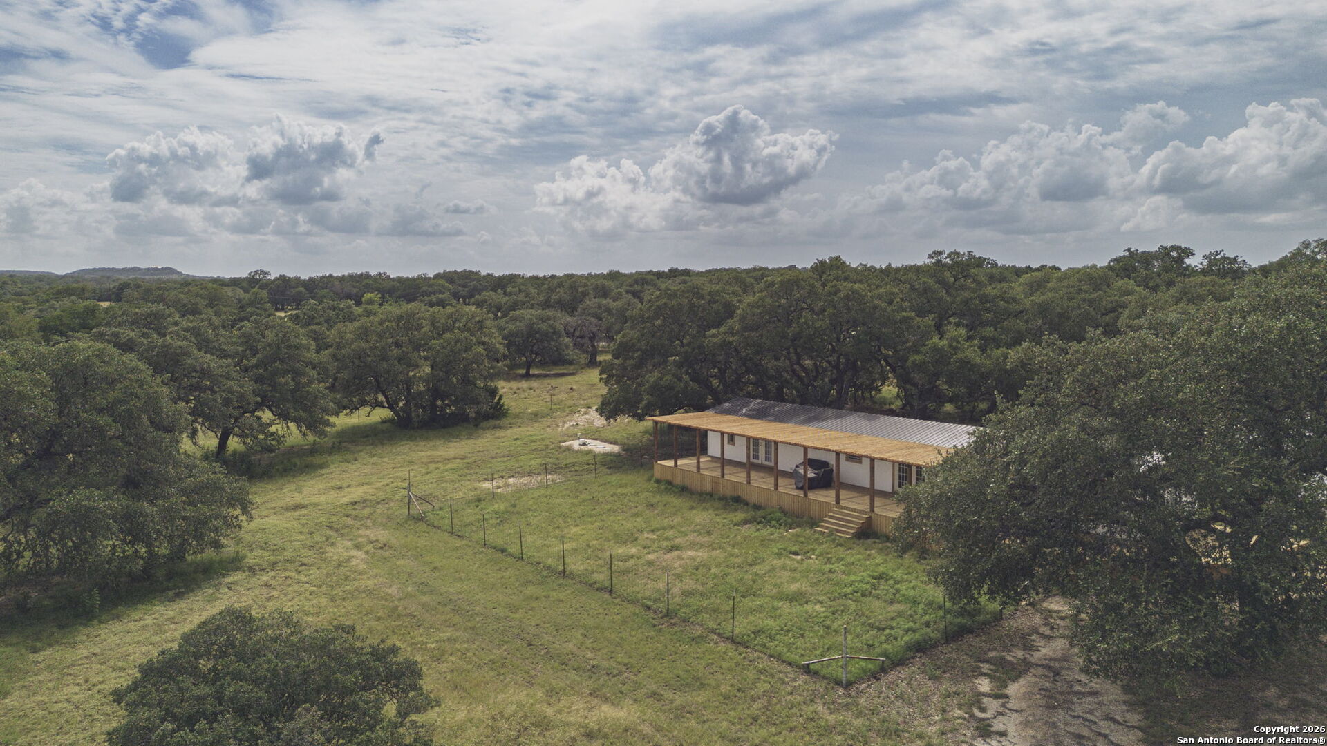 241 Seewald Road Boerne, TX 78006 - Photo 44 of 48 a view of a mountain in the distance in a field