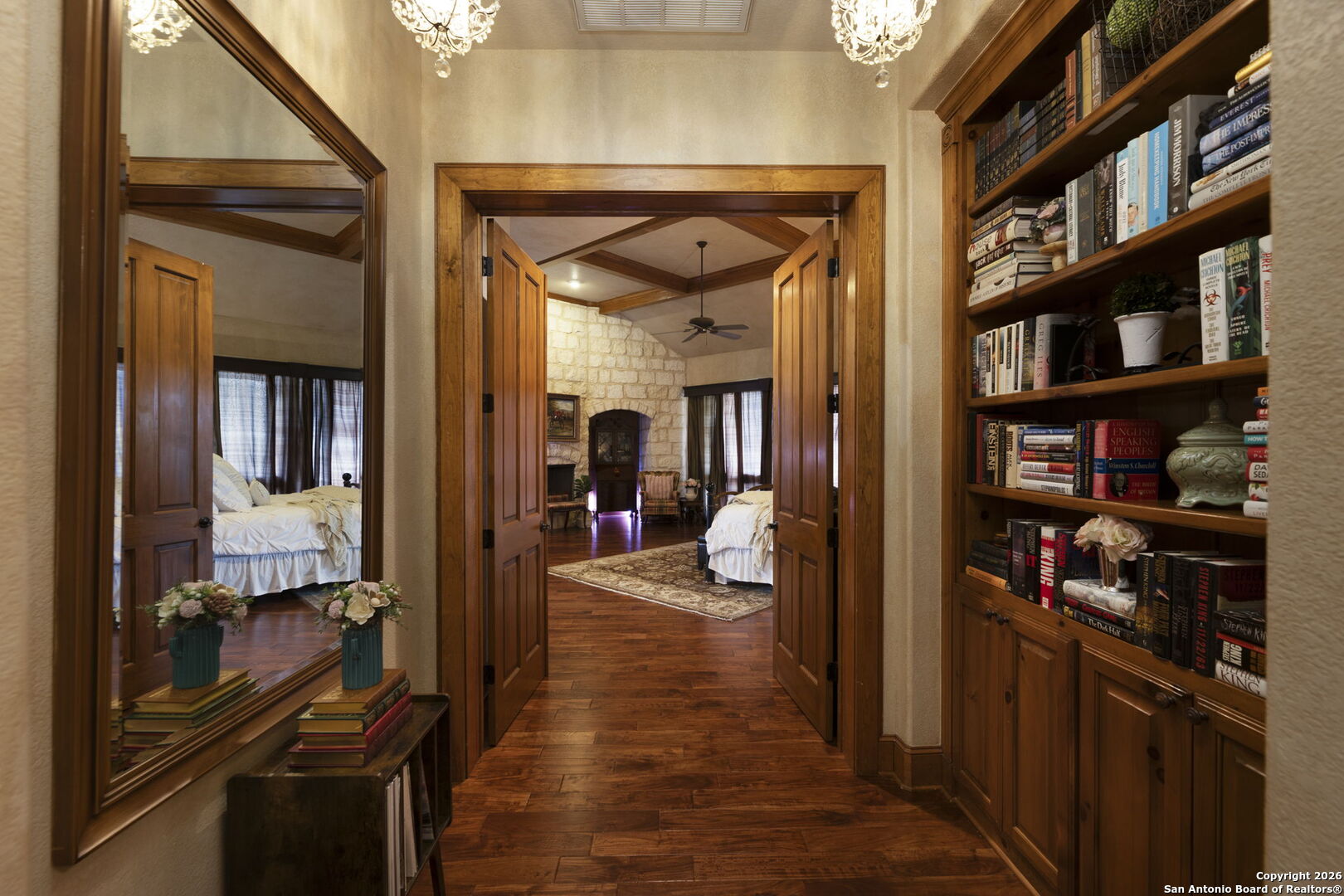 241 Seewald Road Boerne, TX 78006 - Photo 9 of 48 a view of a hallway and a livingroom with furniture
