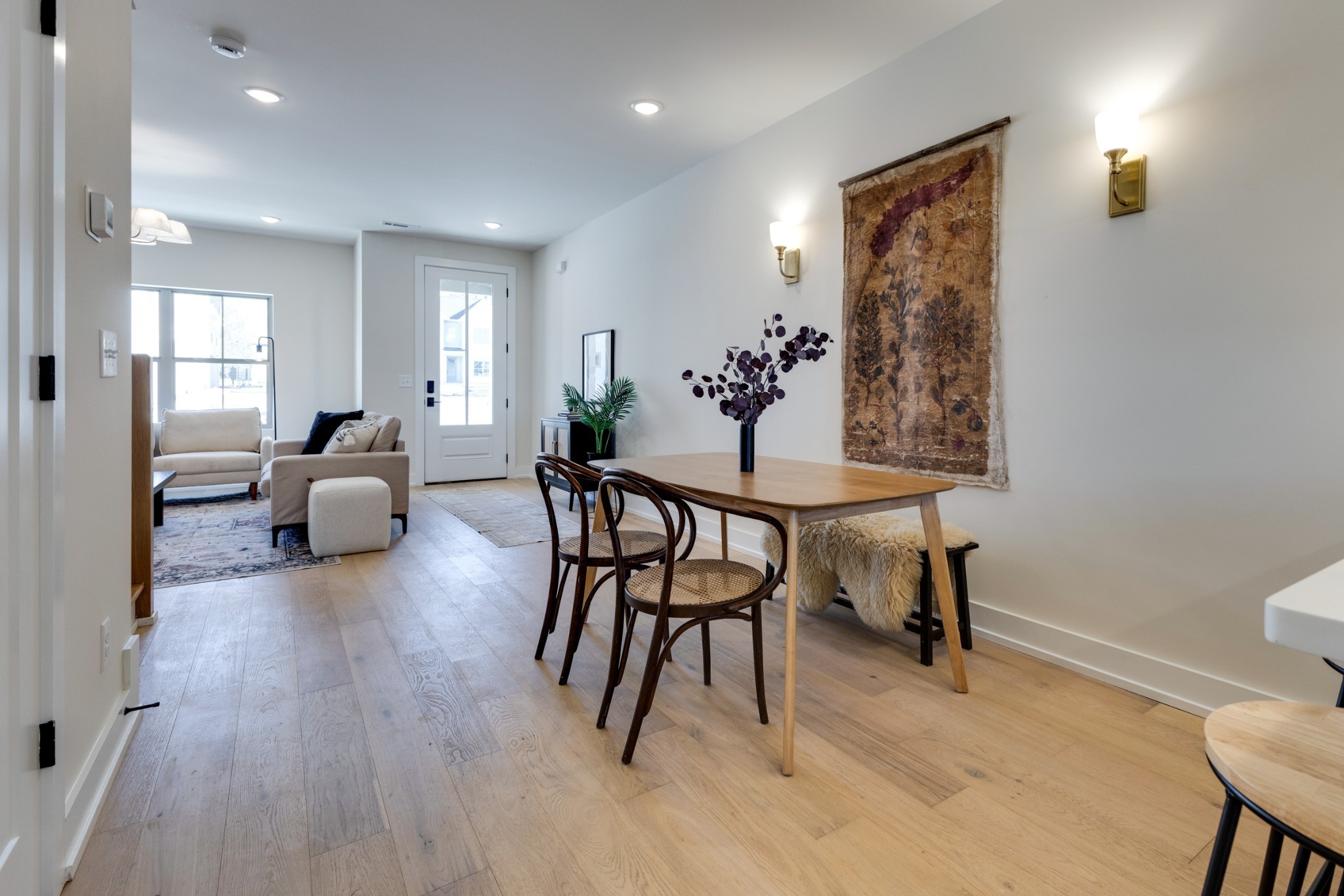 145 Whitsett Road, Unit 6 Nashville, TN 37210 - Photo 11 of 33 a living room with furniture and a dining table with wooden floor