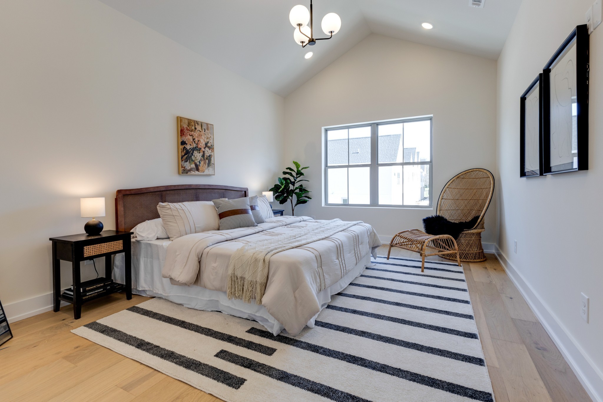 145 Whitsett Road, Unit 6 Nashville, TN 37210 - Photo 22 of 33 a bedroom with a bed chairs and window